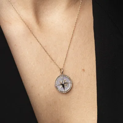 Bicolor gold man's compass pendant with pearl