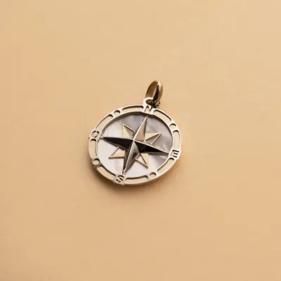 Bicolor gold man's compass pendant with pearl