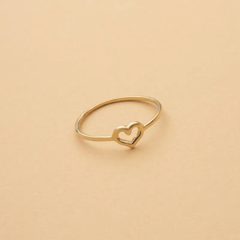 Yellow gold ring with heart sign