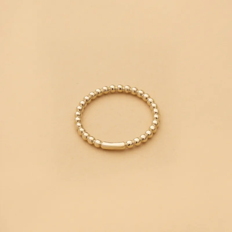 Yellow gold ring with balls