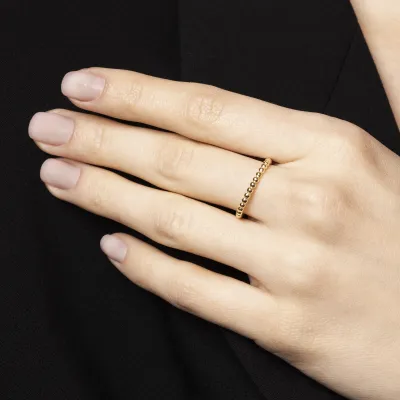 Yellow gold ring with balls