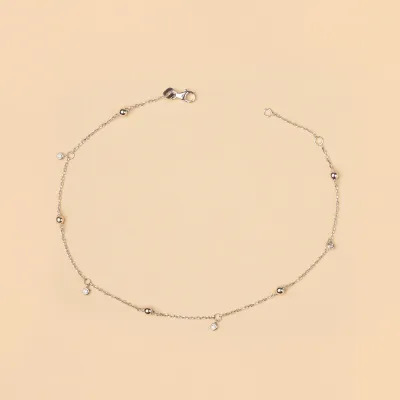White gold anklet with spheres and cubic zirconia