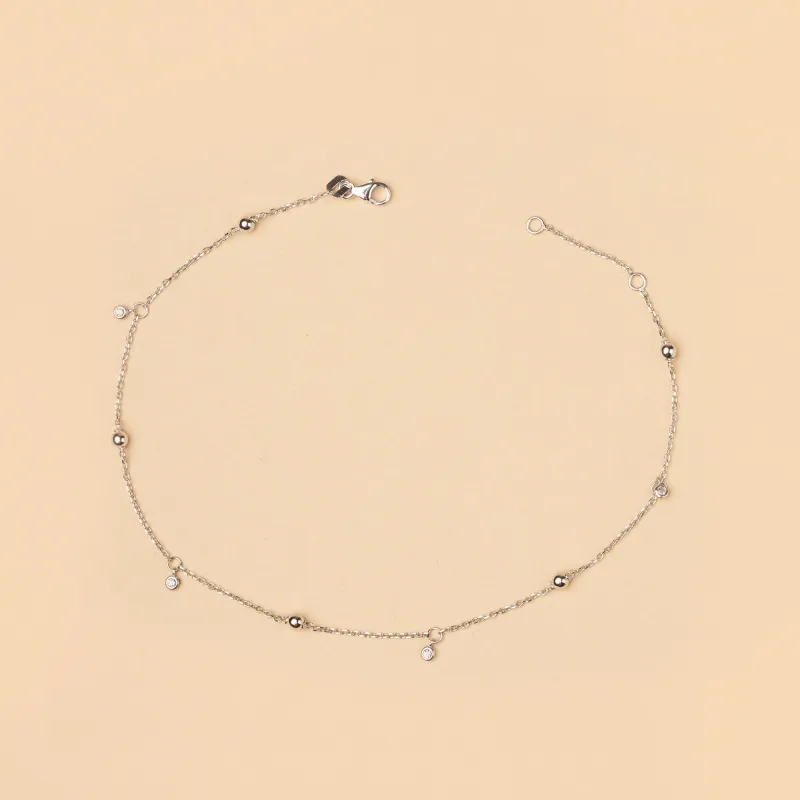 White gold anklet with spheres and cubic zirconia