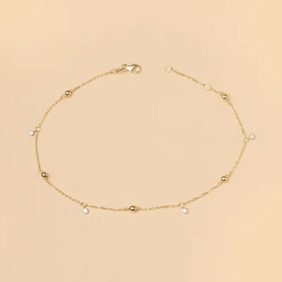Yellow gold anklet with spheres and cubic zirconia