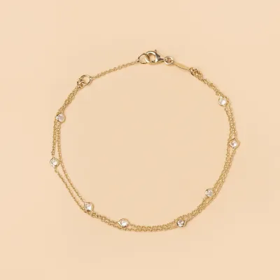 Yellow gold double bracelet with cubic zirconia