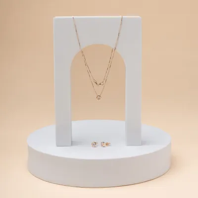 Solitaire set in roségoud met zirkonia: ketting en oorbellen