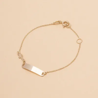 Yellow gold baby bracelet with cross and plate