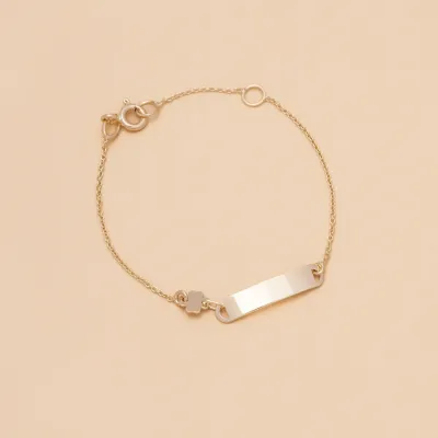 Yellow gold baby bracelet with four-leaf clover and plate