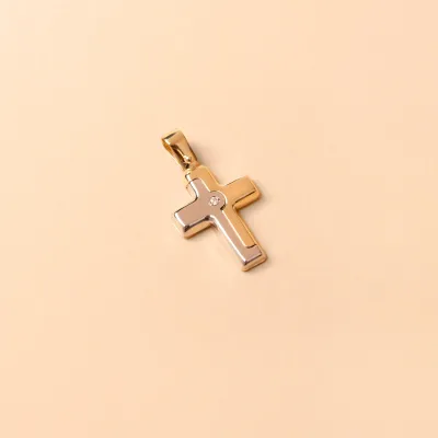 Bicolor gold cross pendant with one small cz