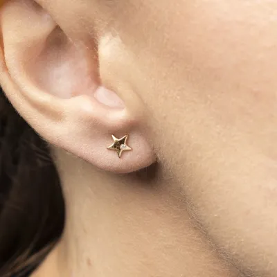 Sternförmige Ohrringe aus Gelbgold mit cubic Zirkonia
