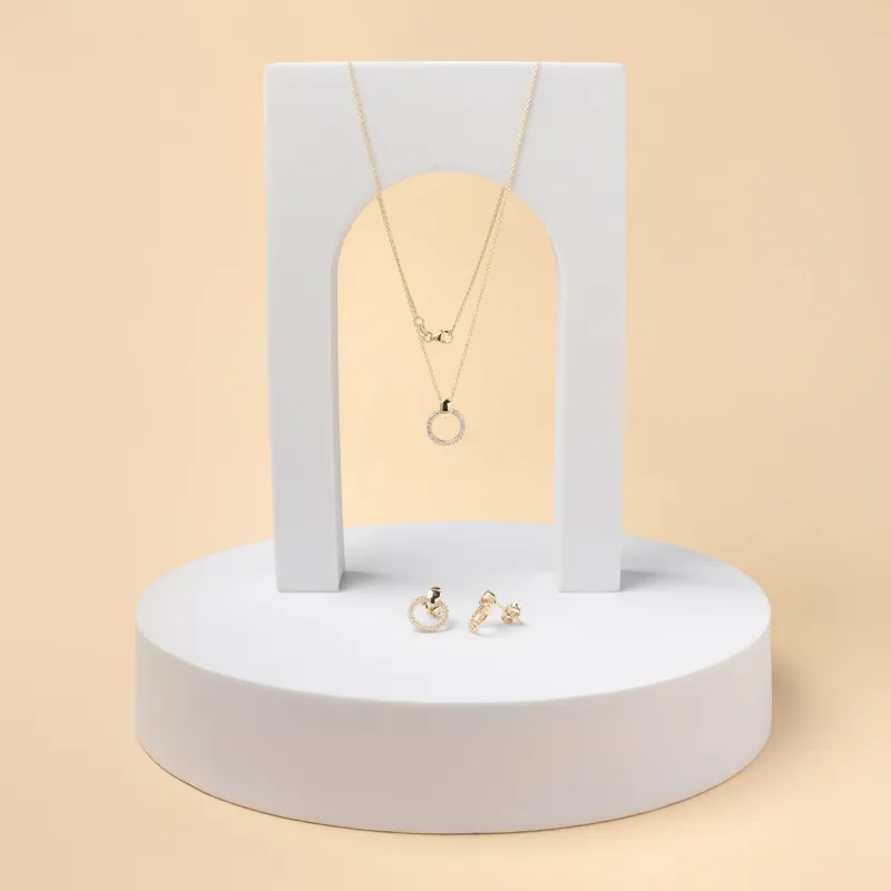 Set (earrings and necklace) in yellow gold with cubic zirconia
