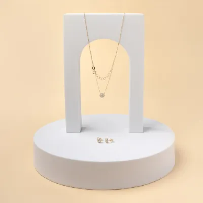 Set (ketting + oorbellen) in geel goud met zirkonia