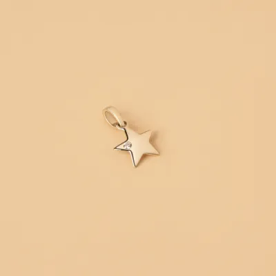 Yellow gold star-shaped pendant with cubic zirconia