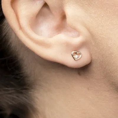 Yellow gold heart-shaped stud earrings with cubic zirconia