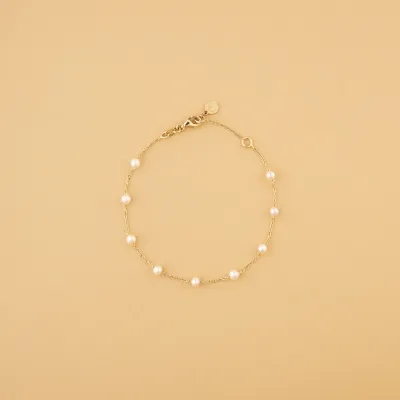 Yellow gold bracelet with pearls