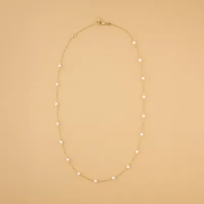 Yellow gold necklace with pearls