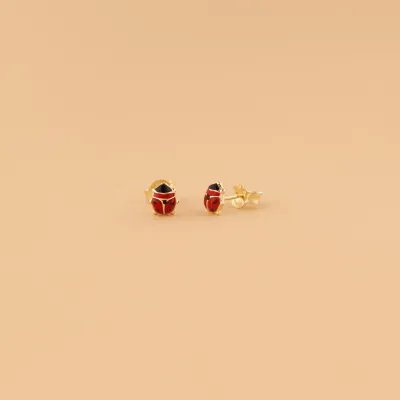 Yellow gold baby earrings with enamelled ladybug