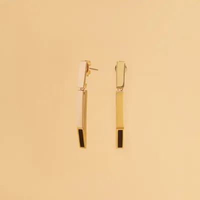 Yellow gold earrings with black enameled details from "Futura" collection