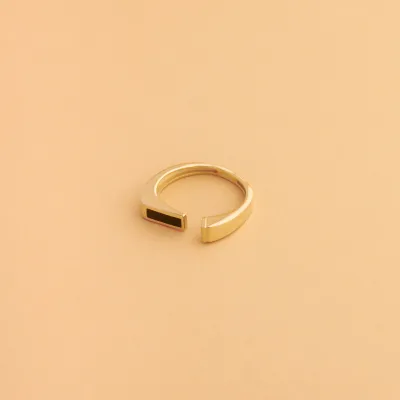 Yellow gold ring with black enameled details from "Futura" collection