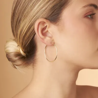 Yellow gold tube earrings 40 mm