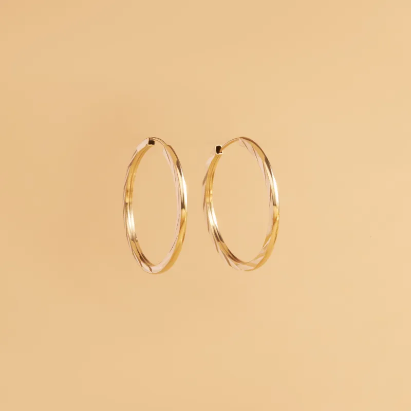 Yellow gold tube earrings 25 mm diamond cut