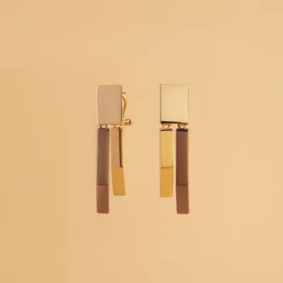 Yellow gold and black rhodium earrings from the "Futura" collection