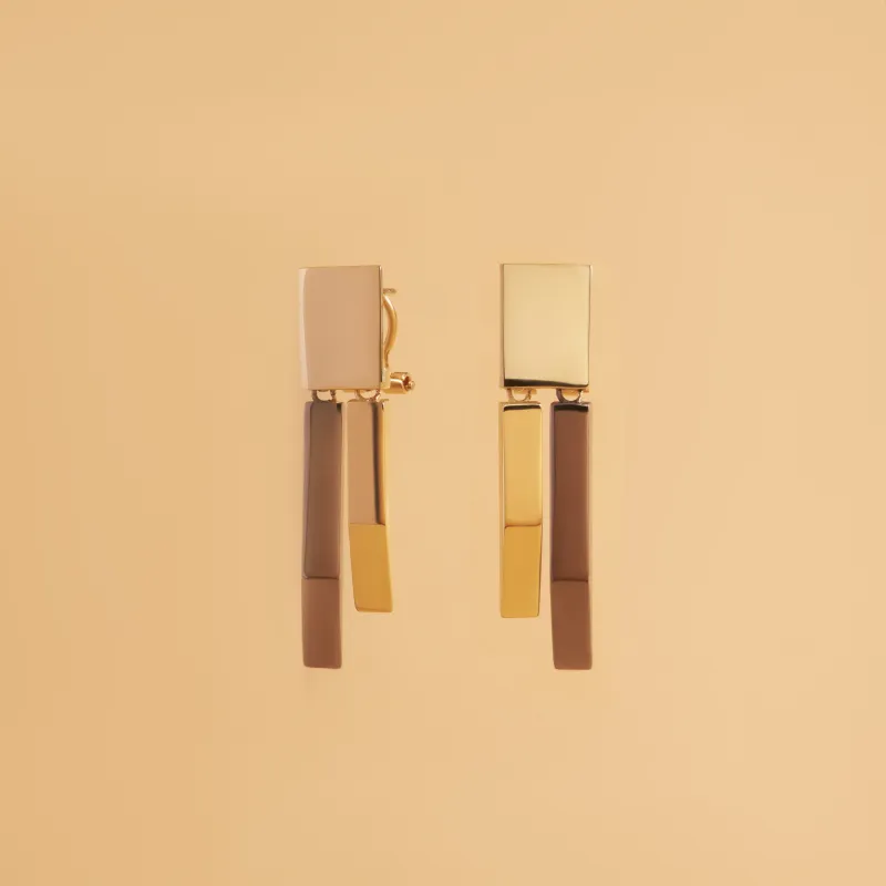 Yellow gold and black rhodium earrings from the "Futura" collection