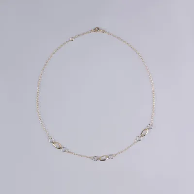 Light necklace in yellow and white gold