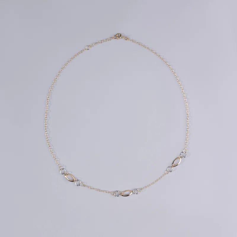 Light necklace in yellow and white gold