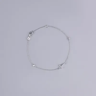 White gold bracelet with cross and cubic zirconia