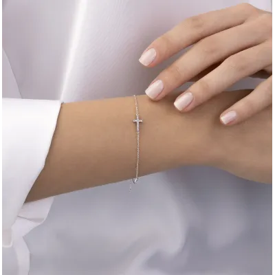 White gold bracelet with cross and cubic zirconia