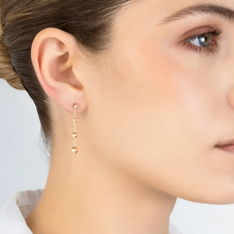 Yellow gold earrings with balls