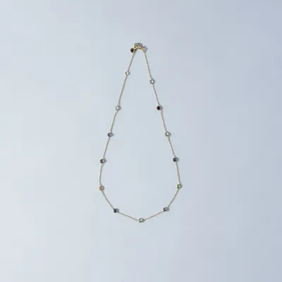 Yellow gold necklace with natural stones