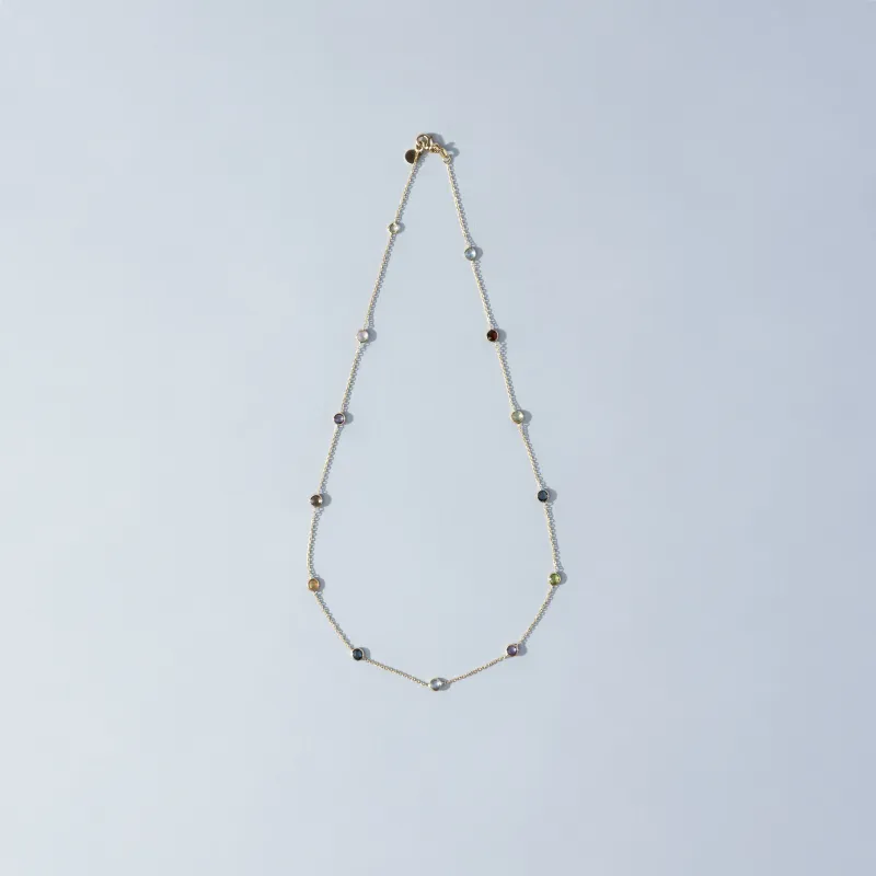 Yellow gold necklace with natural stones