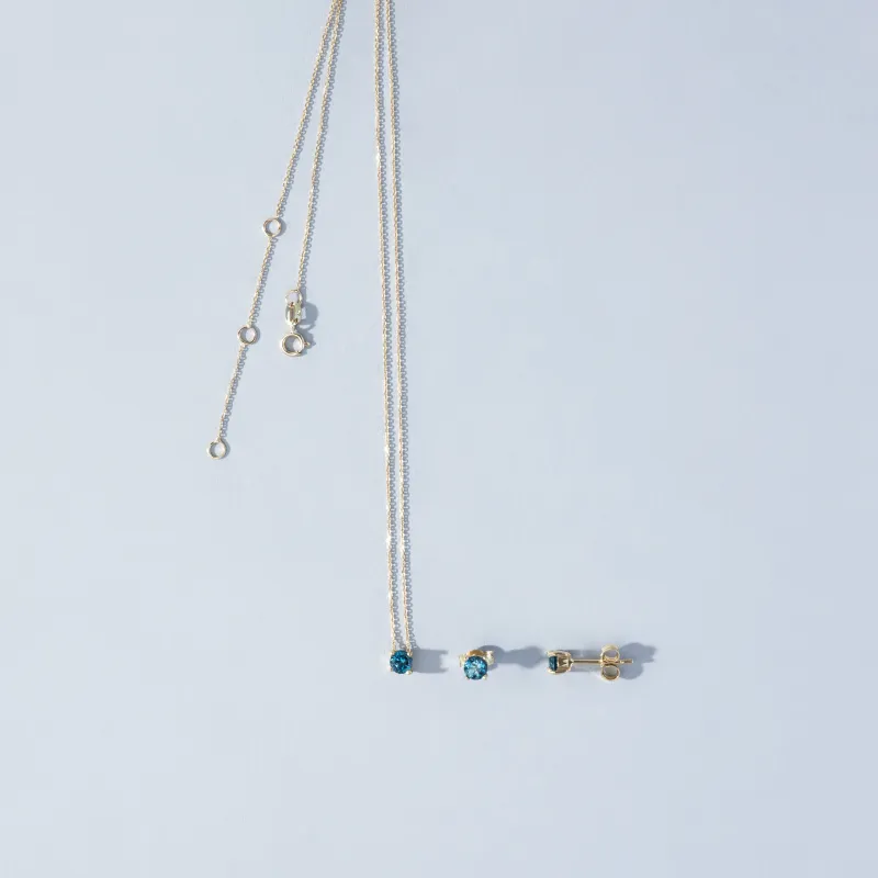 Yellow gold earrings and necklace set with natural stones