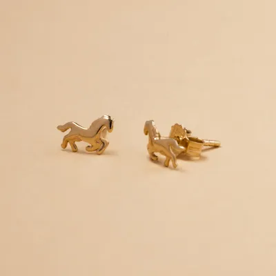 Yellow gold horse-shaped earrings