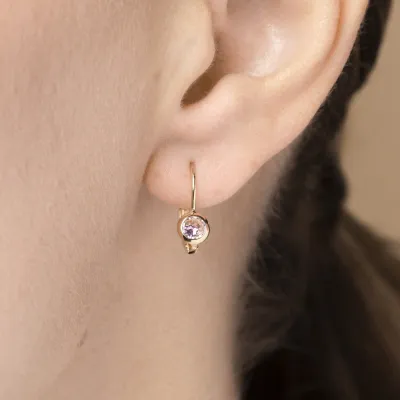 Baby earrings in yellow gold with pink cubic zirconia