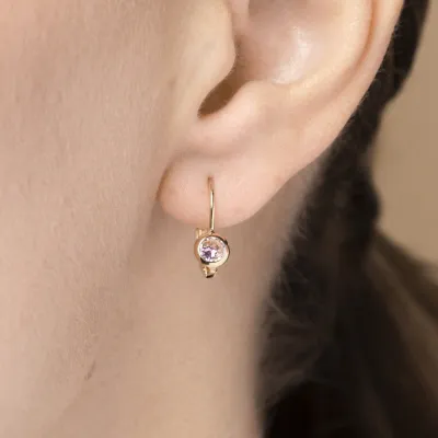 Yellow gold baby earrings with pink cubic zirconia