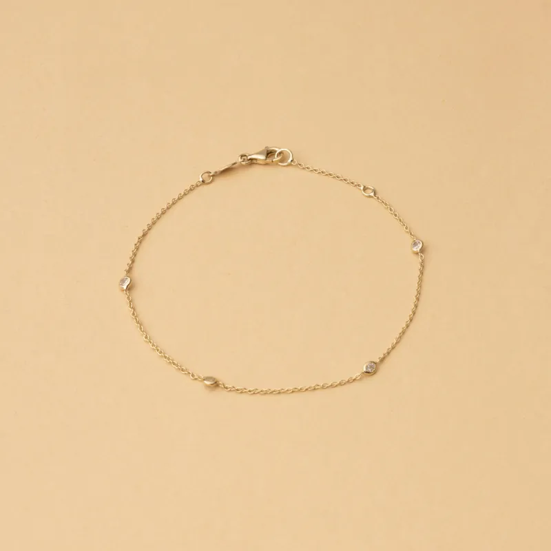 Yellow gold bracelet with white cubic zirconia